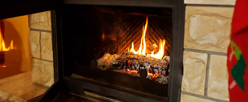 Commercial Prefabricated Fireplace Replacement in Sainte-Marguerite, Quebec